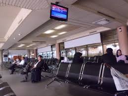 Man_waiting_in_airport